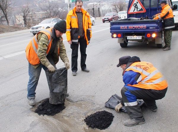 Все про укладку нового асфальта на старый